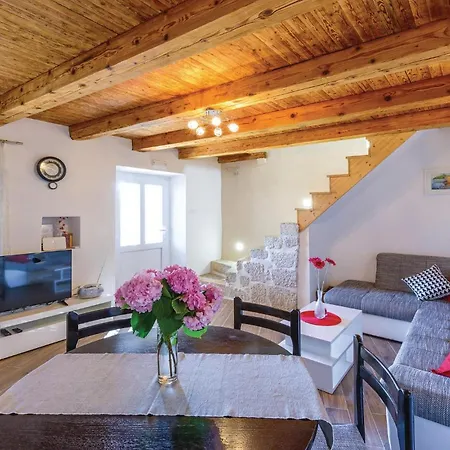 Three-bedroom In Hébergement de vacances